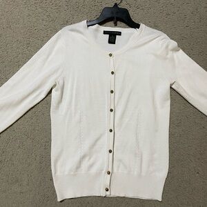 Off-White Button-Up Women's Sweater with ball buttons.